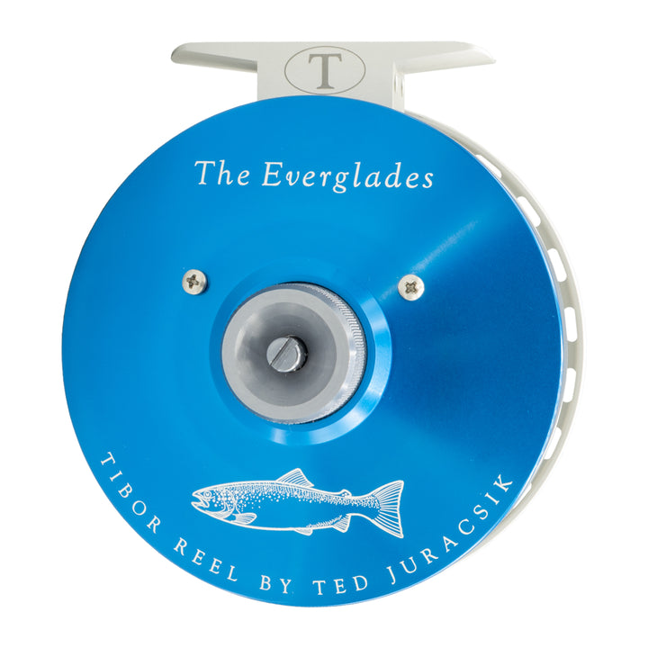 Tibor Everglades Reel Custom Royal Blue Frame, Frost Silver Spool and Reel Foot, Graphite Drag Knob and Stop Nut, Steelhead Engraving